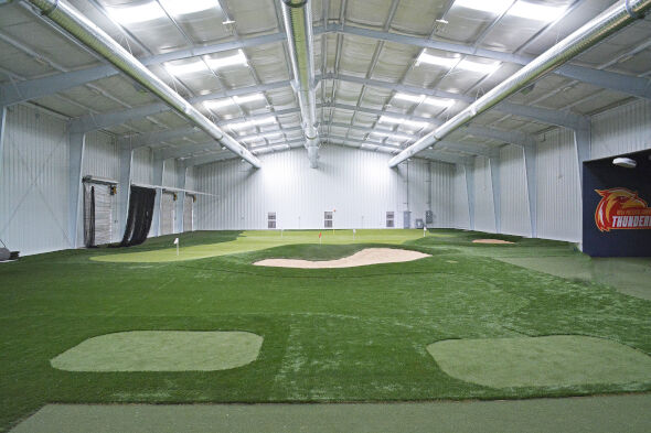 Charlotte indoor putting facility with tee boxes